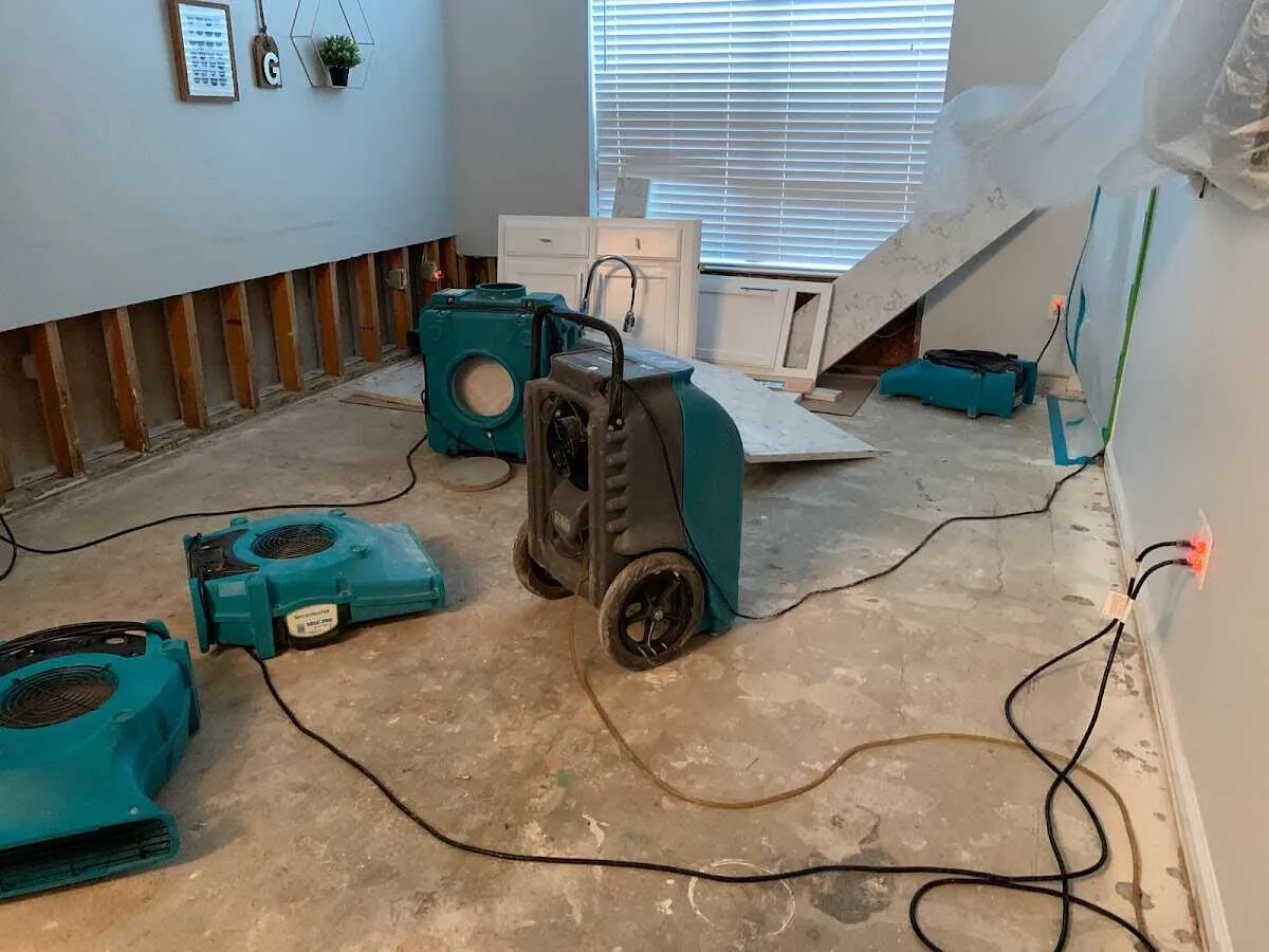 Dehumidifier in flood-cut room for Water Damage Restoration in Santa Teresa